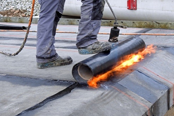 a heat-welded asphalt rolled roof