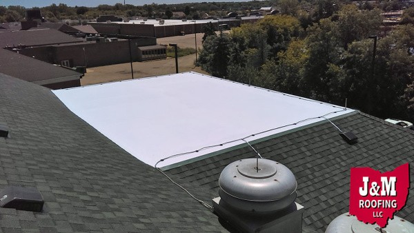 Membrane roof restoration completed.